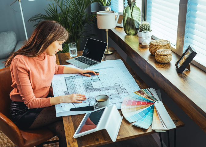 Designer Looking at Floorplan